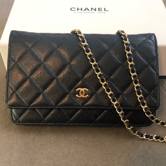 CHANEL Handbags - Chanel black caviar WOC GHW